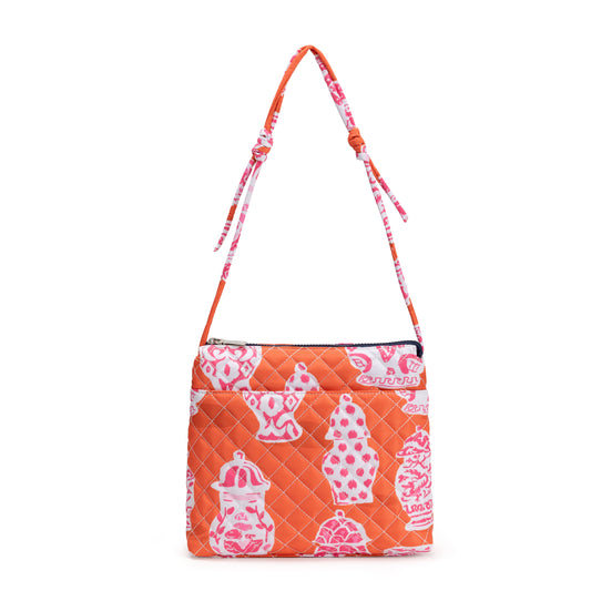 Berkeley Square Crossbody Bag by Mayfair & Finch featuring quilted design, vibrant French ticking lining, chrome accents, and zip pockets for chic everyday use.