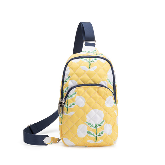 Dover Sling quilted crossbody bag by Mayfair & Finch with vibrant lining and bonus Bond Bag, designed for compact everyday essentials.